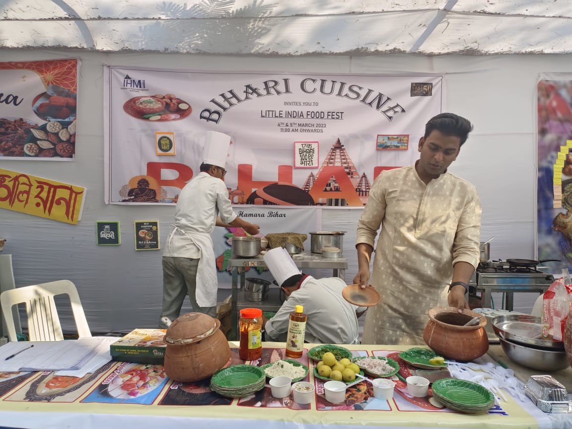 Bihari Cuisine stall — earthen handi and a bottle of mustard oil — Little India Food Fest, IHM-Hyderabad · March 2023
